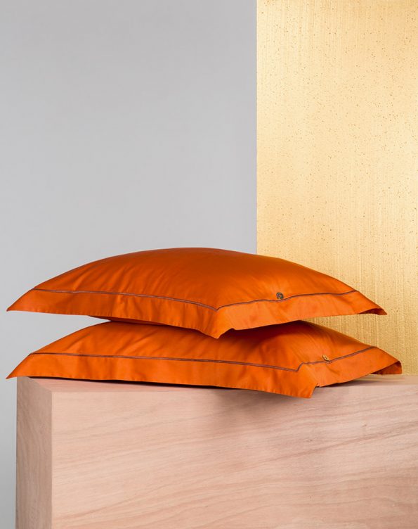 Orange embroidered pillowcases