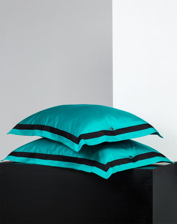 Turquoise shams with ribbons