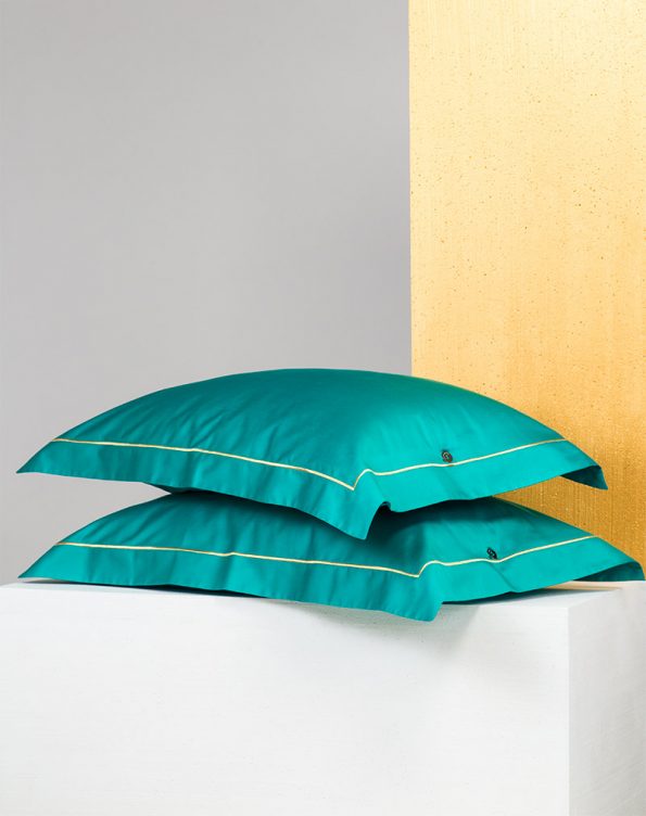 Teal embroidered shams