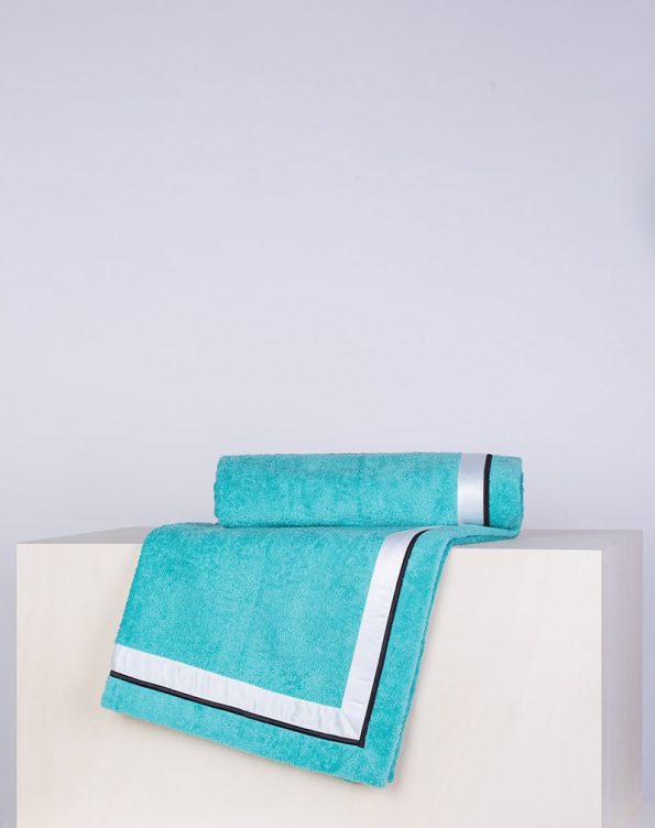Turquoise embroidered beach towel